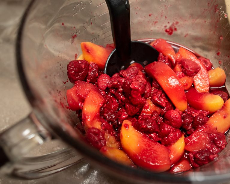 Dutch Oven Peach Raspberry Cobbler